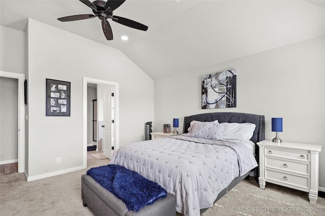 bedroom featuring carpet floors, lofted ceiling, a ceiling fan, connected bathroom, and baseboards