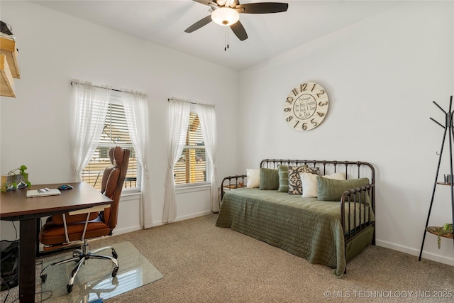 bedroom with carpet floors, a ceiling fan, and baseboards