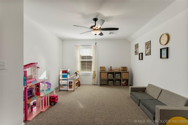 game room with carpet, visible vents, baseboards, and ceiling fan