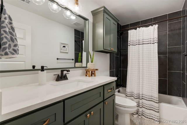 bathroom with toilet, visible vents, shower / tub combo with curtain, and vanity