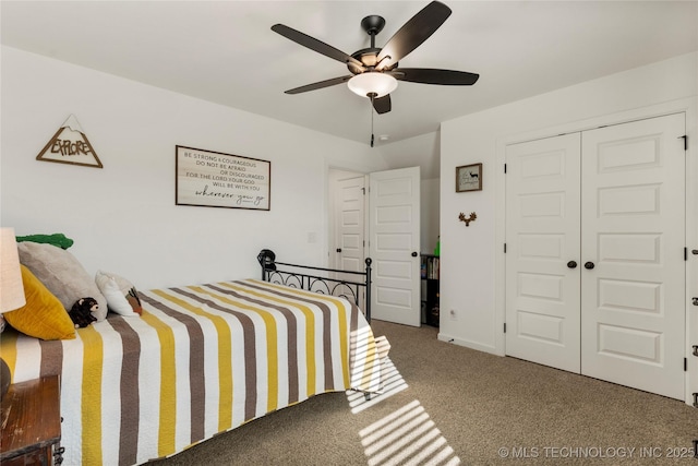 bedroom with carpet flooring, a closet, and a ceiling fan