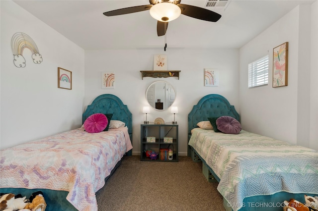 bedroom with ceiling fan and carpet floors