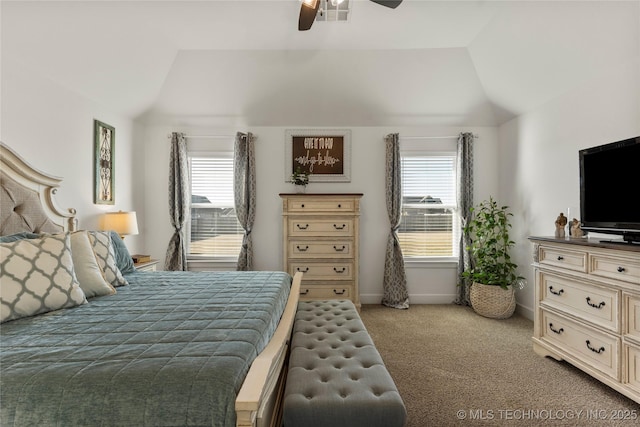 bedroom featuring baseboards, visible vents, a ceiling fan, light colored carpet, and lofted ceiling