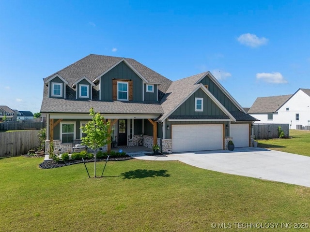 view of front of home with a front lawn, fence, covered porch, concrete driveway, and an attached garage