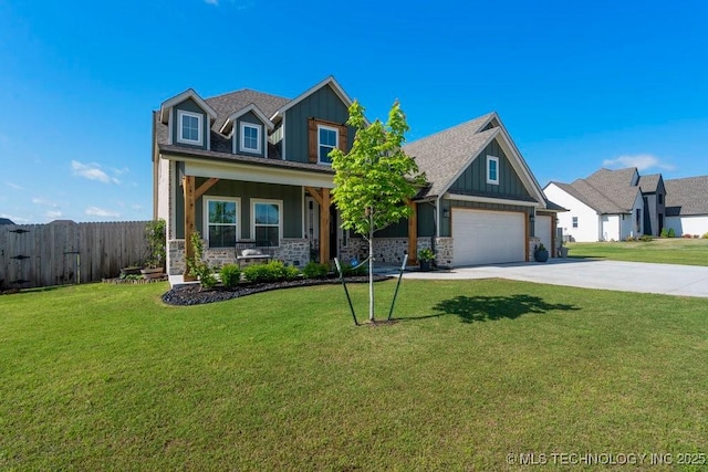 view of front of property with board and batten siding, a porch, fence, concrete driveway, and stone siding