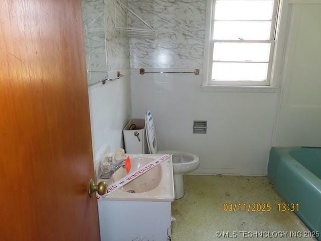 full bathroom with a bath, toilet, and vanity