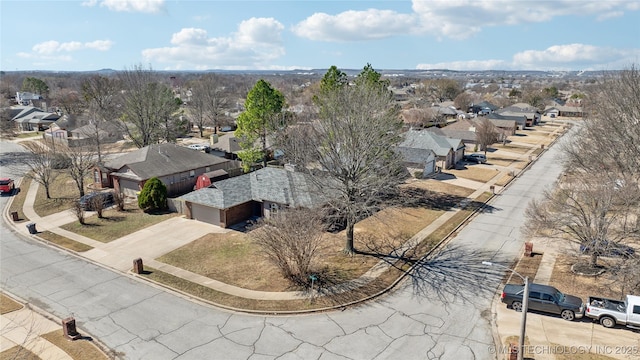 birds eye view of property with a residential view