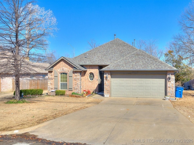 ranch-style home with an attached garage, driveway, a shingled roof, and fence