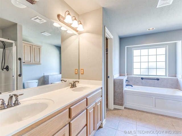 full bath featuring visible vents, a sink, and tile patterned floors