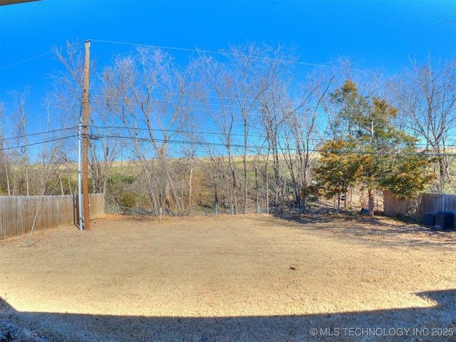 view of yard featuring fence