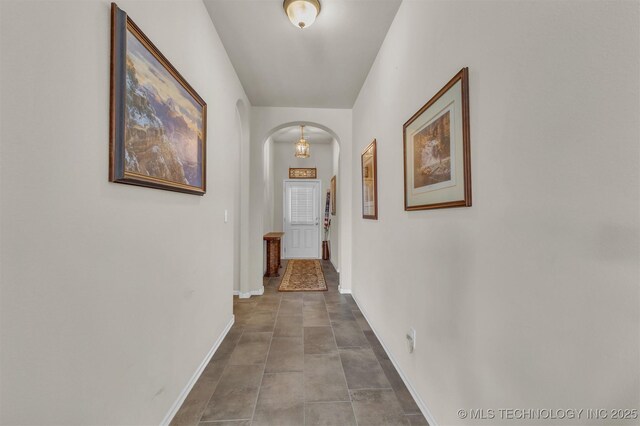 3838 E 144th St S, Bixby, OK 74008 - corridor featuring arched walkways and baseboards