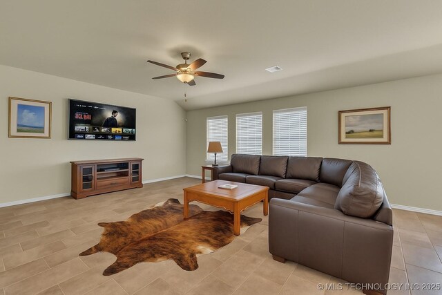 3838 E 144th St S, Bixby, OK 74008 - living area featuring a ceiling fan and light tile patterned floors