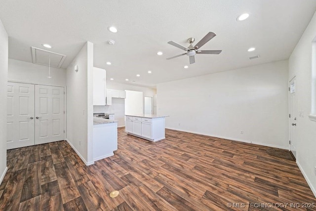 517 W Clyde Ave, Vinita, OK 74301 - kitchen featuring recessed lighting, dark wood-style floors, white cabinetry, a ceiling fan, and open floor plan