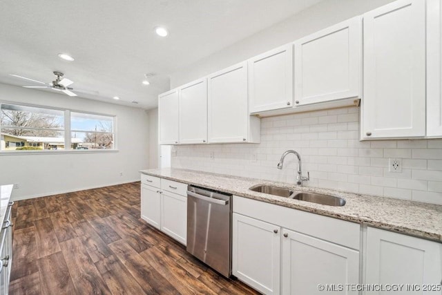 517 W Clyde Ave, Vinita, OK 74301 - kitchen with dishwasher, a sink, tasteful backsplash, white cabinets, and dark wood-type flooring
