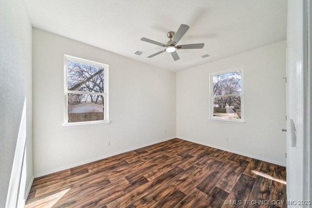 517 W Clyde Ave, Vinita, OK 74301 - unfurnished room featuring wood finished floors, ceiling fan, and baseboards