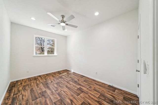 spare room with dark wood-type flooring, ceiling fan, recessed lighting, and visible vents