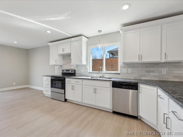 4613 S Linwood Dr, Sand Springs, OK 74063 - kitchen featuring stainless steel appliances, a sink, white cabinetry, light wood finished floors, and tasteful backsplash