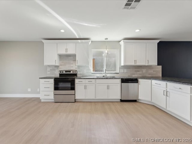 4613 S Linwood Dr, Sand Springs, OK 74063 - kitchen with visible vents, light wood-style flooring, stainless steel appliances, white cabinetry, and a sink