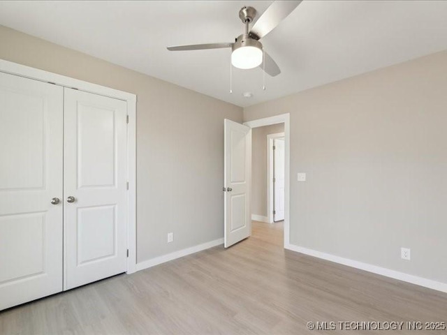 4613 S Linwood Dr, Sand Springs, OK 74063 - unfurnished bedroom featuring ceiling fan, a closet, light wood-style flooring, and baseboards