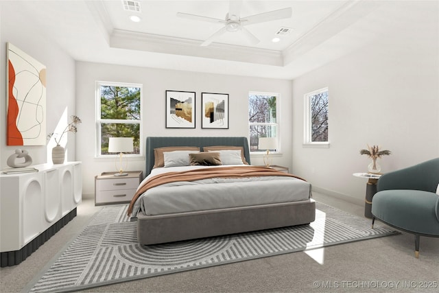 carpeted bedroom featuring a raised ceiling, visible vents, and ornamental molding