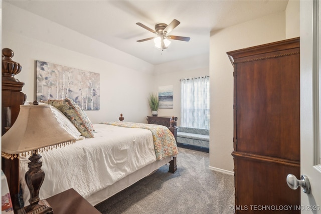 bedroom with ceiling fan, baseboards, and carpet flooring