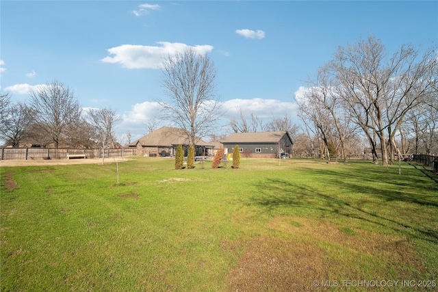 view of yard featuring fence