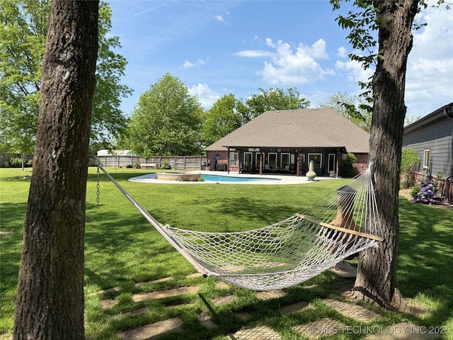 view of yard featuring a fenced backyard and a fenced in pool