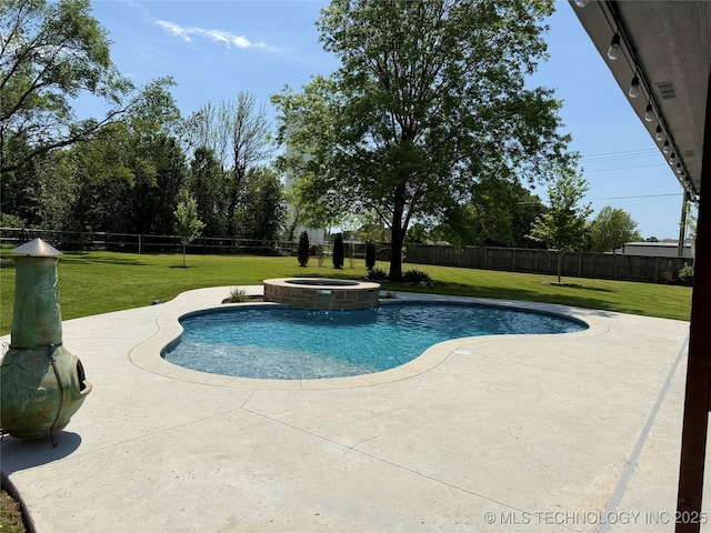 view of pool with a lawn, a patio area, and a fenced backyard