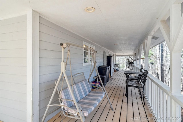 wooden terrace with visible vents