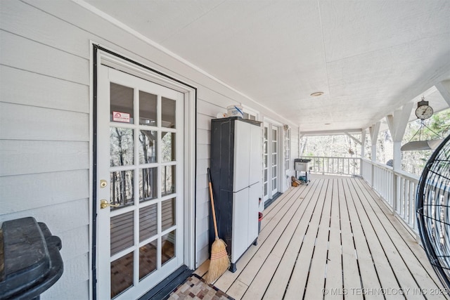 wooden terrace featuring a porch