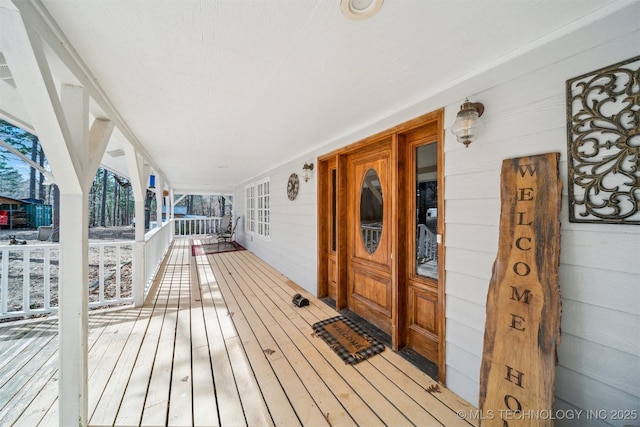 wooden deck with covered porch