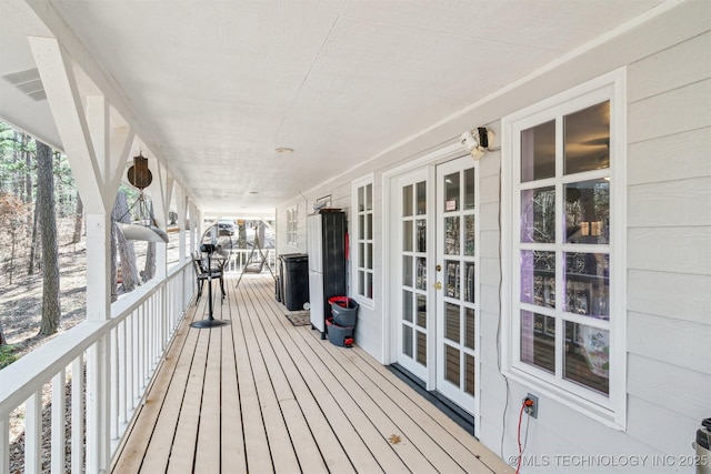 wooden deck with french doors