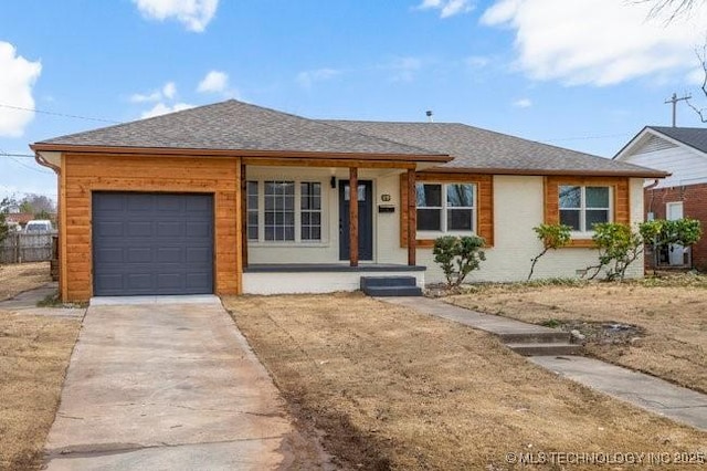 ranch-style house with a shingled roof, driveway, and an attached garage