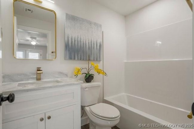 full bathroom with toilet, bathtub / shower combination, visible vents, and vanity