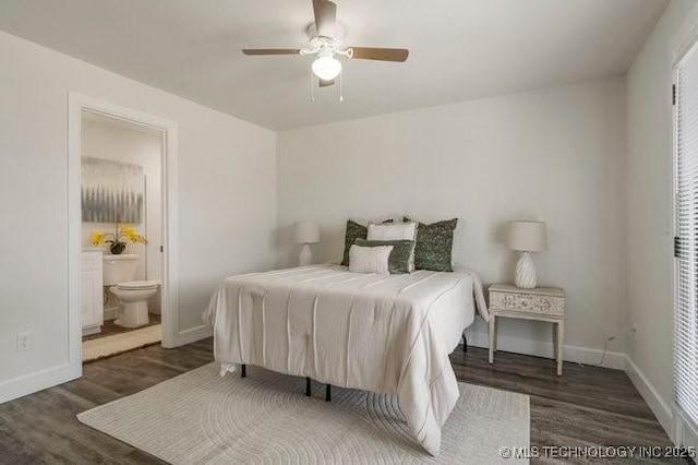 bedroom featuring ensuite bathroom, ceiling fan, baseboards, and wood finished floors