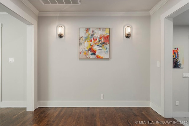 interior space featuring visible vents, crown molding, baseboards, and dark wood-style flooring