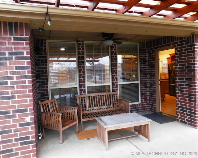 view of patio / terrace featuring ceiling fan, a porch, and a pergola