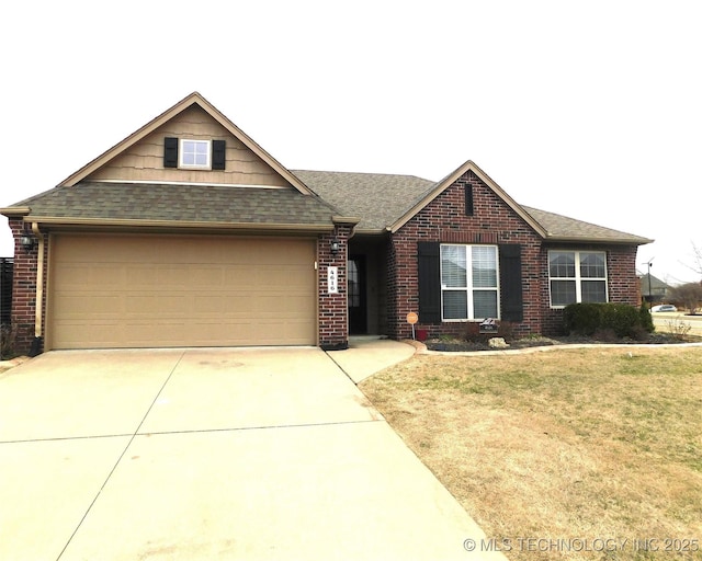 view of front facade featuring concrete driveway, brick siding, an attached garage, and a front yard