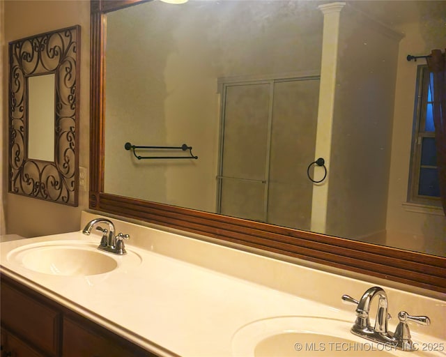 bathroom with double vanity and a sink