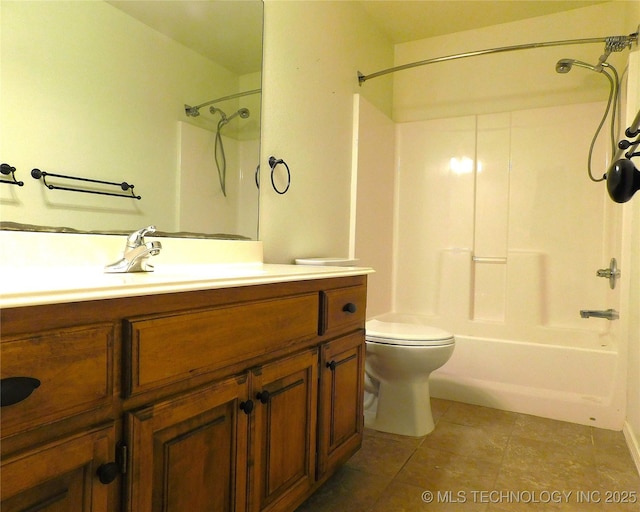 bathroom with  shower combination, tile patterned flooring, toilet, and vanity