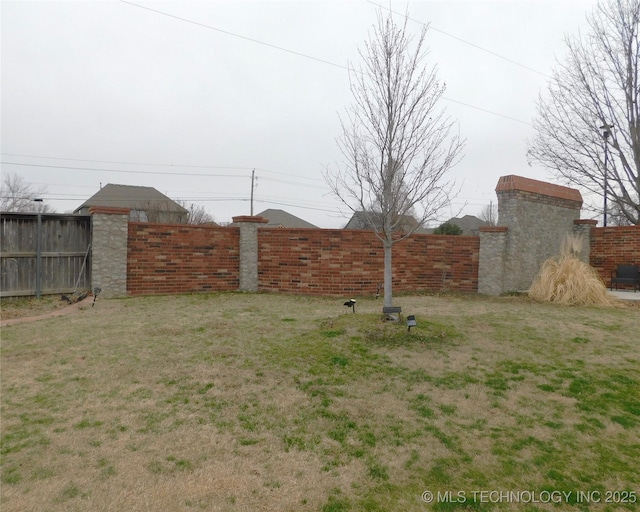 view of yard with fence