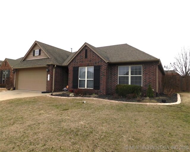 ranch-style house with a garage, brick siding, and a front yard