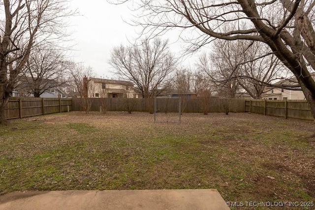 view of yard featuring a fenced backyard