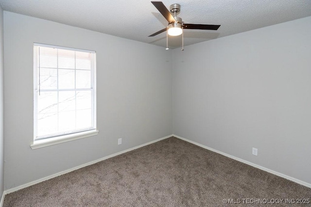 unfurnished room featuring a textured ceiling, carpet flooring, a ceiling fan, and baseboards