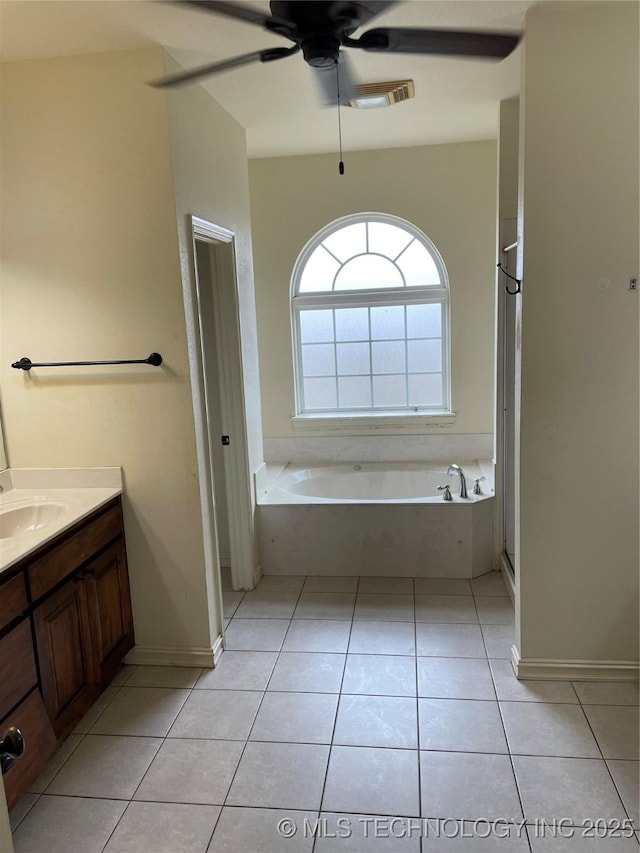 full bathroom featuring visible vents, a ceiling fan, tile patterned flooring, vanity, and a bath