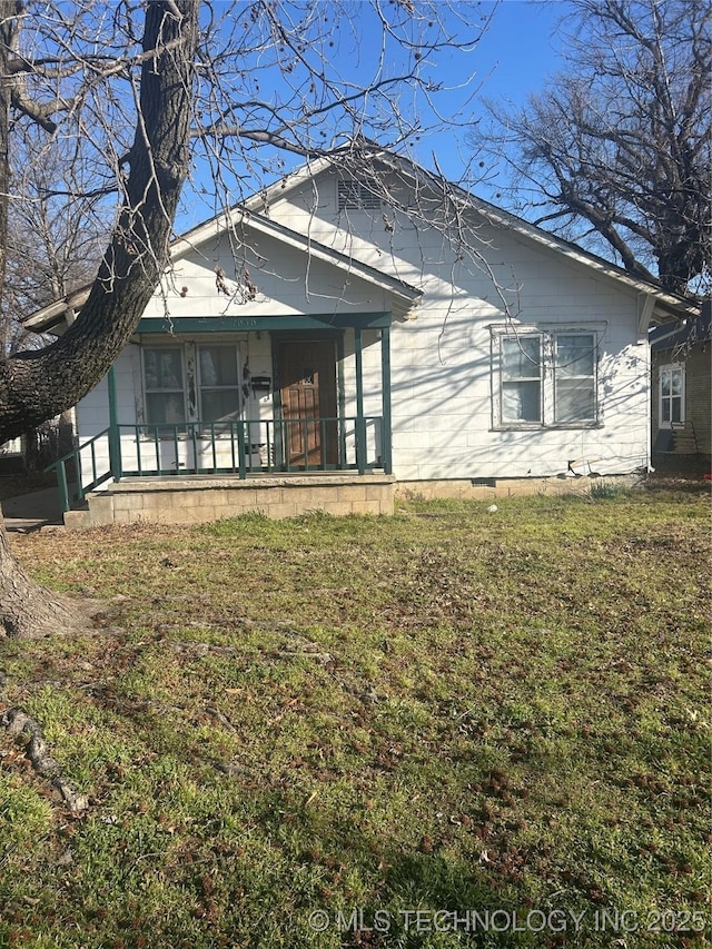 exterior space featuring a front lawn