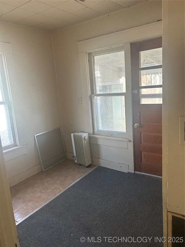 entryway with radiator heating unit