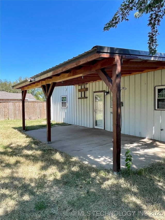 view of patio / terrace featuring fence