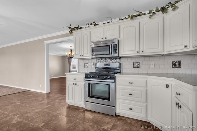 kitchen with white cabinets, decorative backsplash, stainless steel appliances, and crown molding