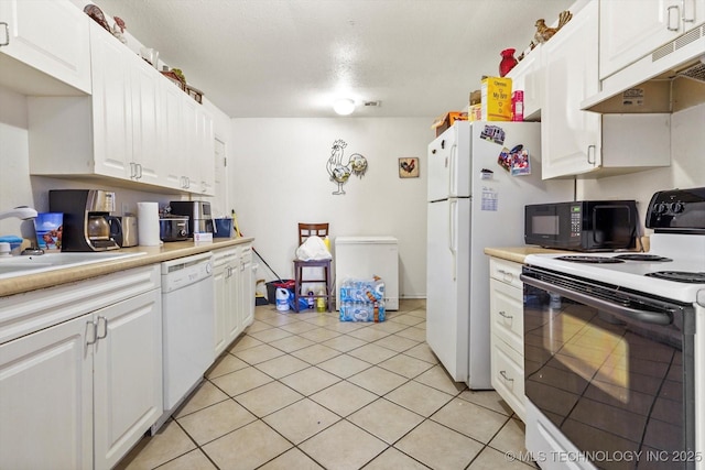 kitchen featuring range with electric stovetop, white cabinetry, white dishwasher, black microwave, and under cabinet range hood